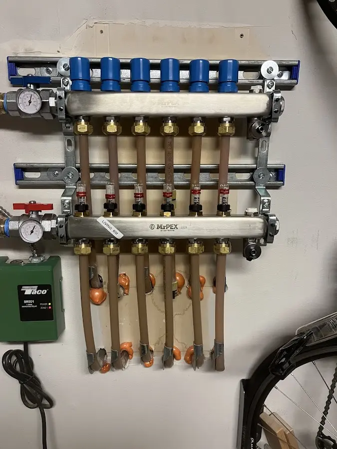 Plumber performing Water Heater Repair at a residential property in Tehaleh